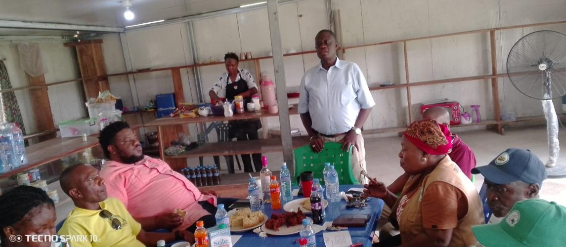 Dr. Arthur Bob Karnuah addresses professional staff during the coffee break