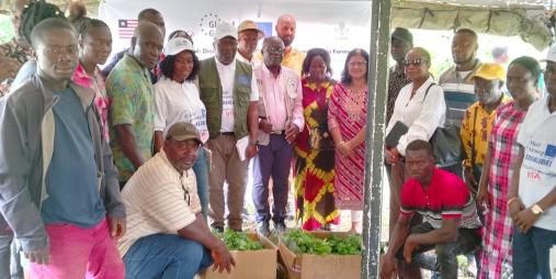 Stakeholders and farmers at the coffee seedlings distribution event at CARI